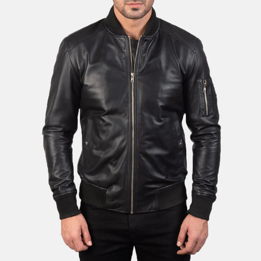 Premium black leather bomber jacket for men, offering timeless style, comfortable ribbed trims, and a practical arm utility pocket.