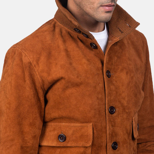 Front view of a man modeling a brown leather aviator jacket, showing the folded shirt collar, zippered front, and ribbed waist hem.