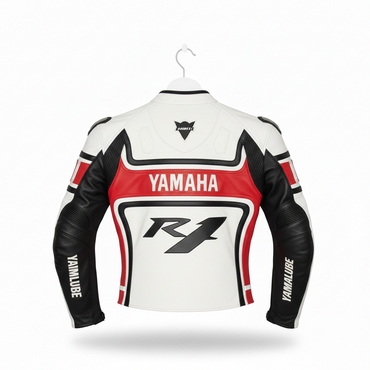 Detailed view of the Yamaha chest branding, R1 torso logo, and external hard-shell shoulder on a white and red racing jacket.