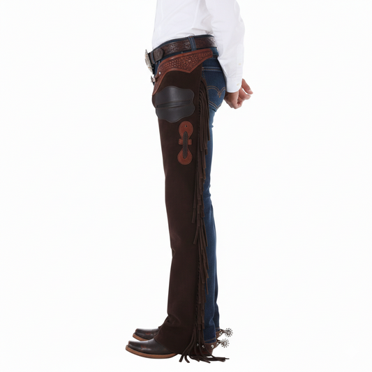 Close-up of the embossed floral leather waistband, metallic silver buckle, and integrated hip utility pocket on western riding chaps.