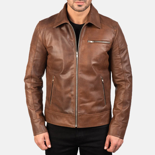 Front view of a man modeling an open rich brown leather jacket, showing the shirt-style point collar and horizontal zippered chest pocket.