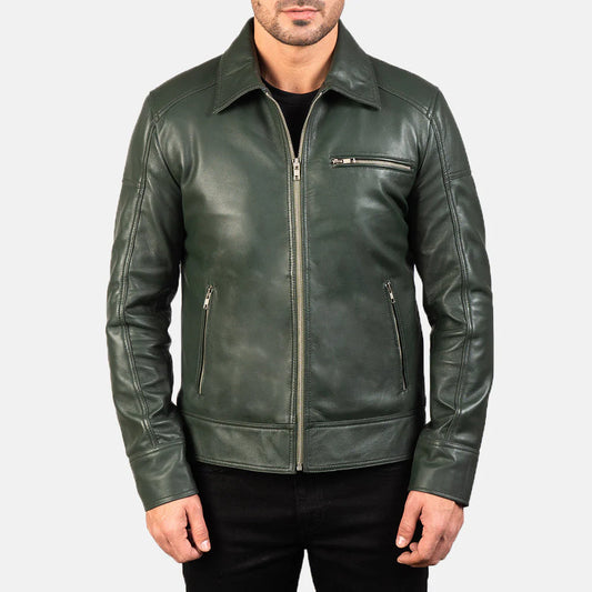 Front view of a man modeling an open forest green leather jacket, showing the point collar and a single zippered chest pocket.