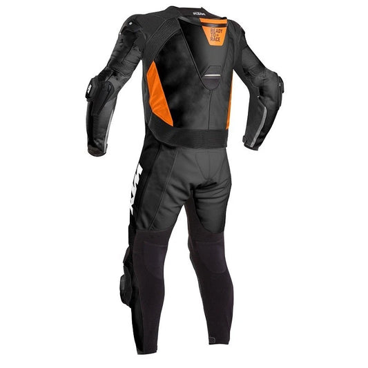 Professional track suit featuring an aerodynamic KTM livery with integrated safety armor and stretch zones.