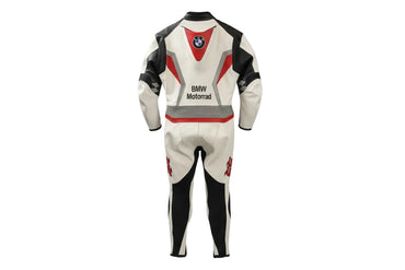 Detailed view of the BMW roundel, perforated leather panels, and 'RR' shoulder graphics on a professional racing suit.
