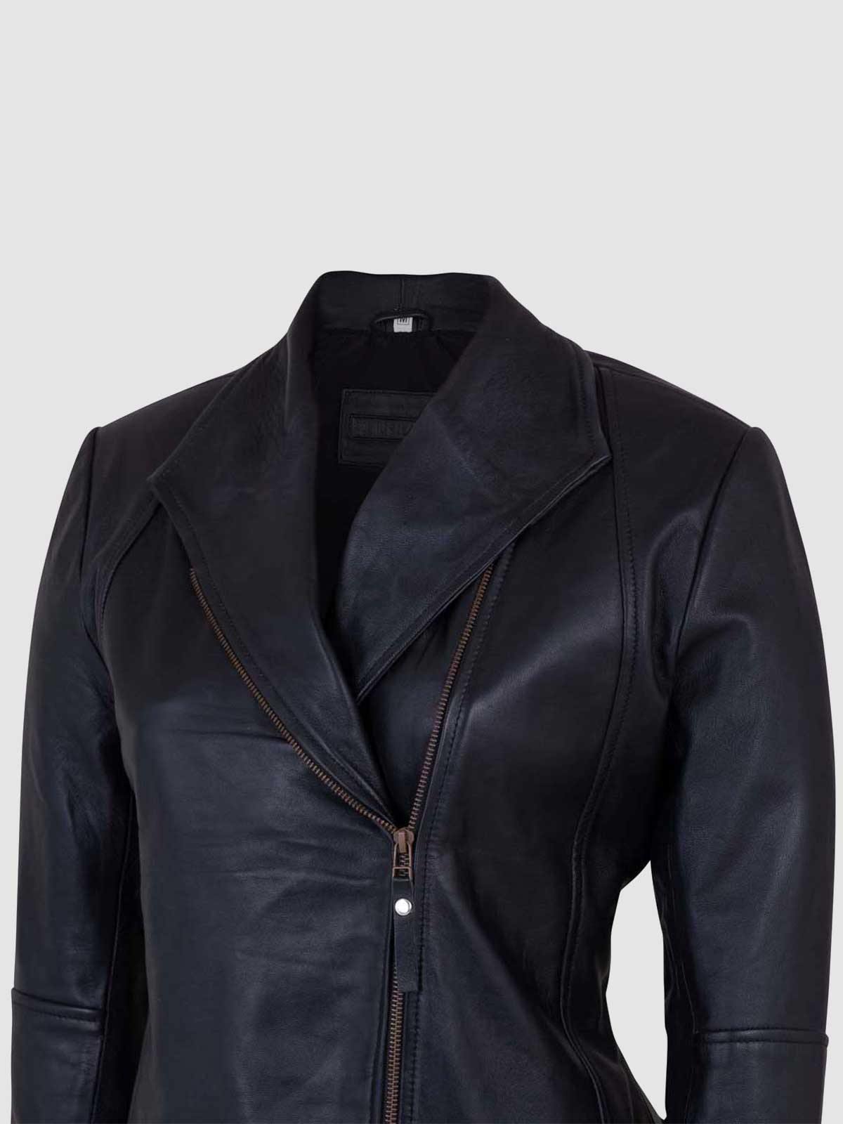 Front view of a black leather jacket for women, showing the classic fold-down collar, silver zippers, and a unique flap pocket detail.