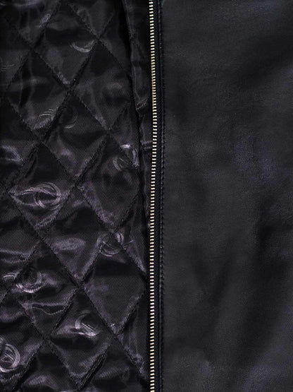 Black leather moto jacket. Women's quilted shoulders, asymmetrical zip, notched lapel.
