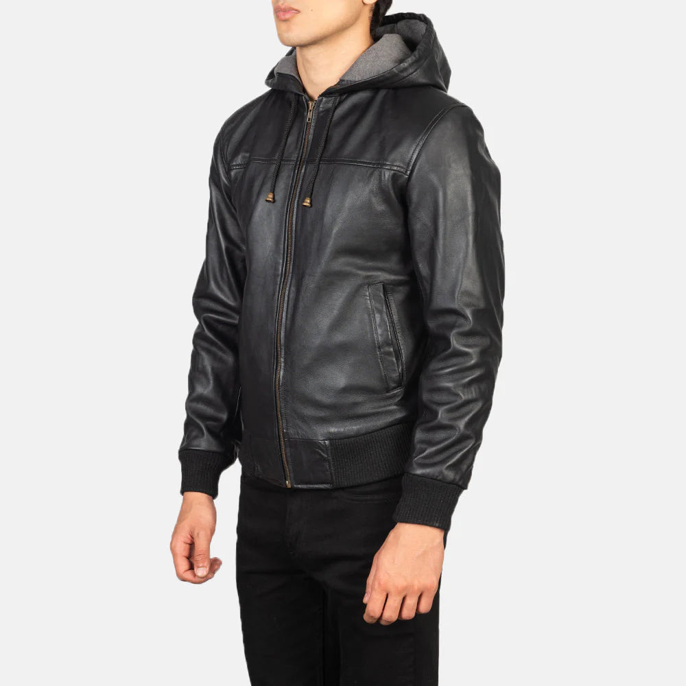 Black leather bomber. Aviator style, utility pocket, ribbed cuffs, band collar.