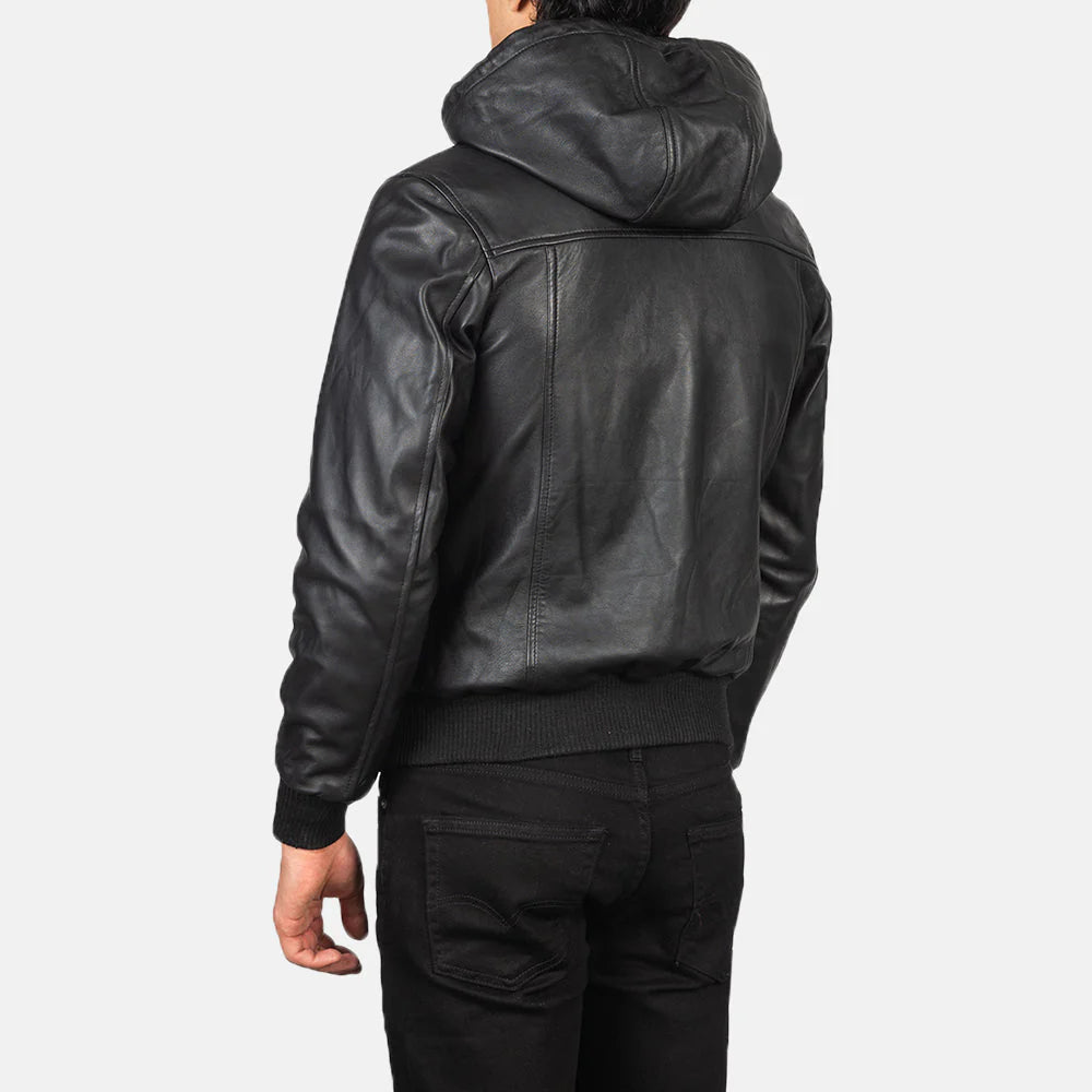 Smooth black leather bomber jacket with contrasting ribbed knit collar, cuffs, and hem, and a functional zippered arm pocket.