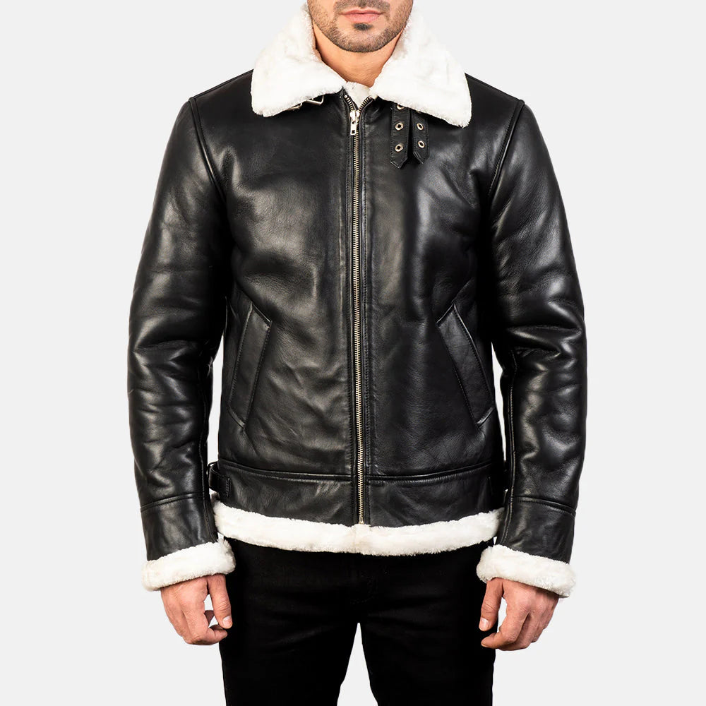 Front view of a rugged black sheepskin leather jacket, fully lined with thick white shearling, and a large white fur lapel collar.