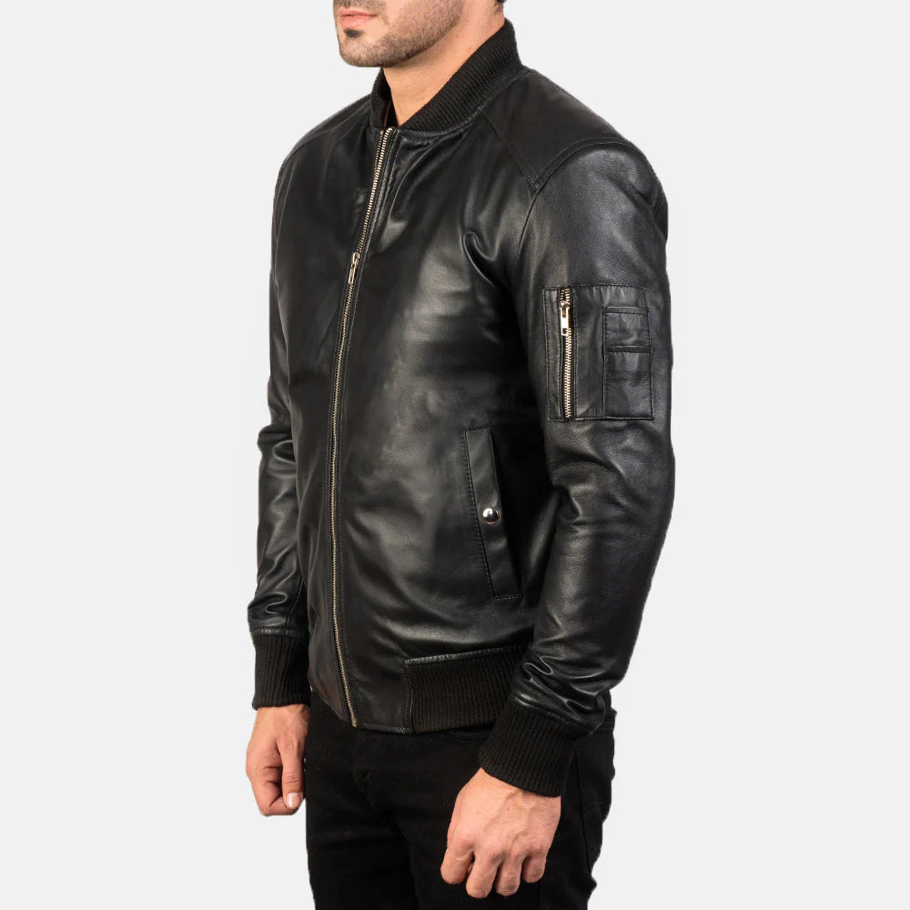 Men's Aviator black leather bomber jacket. Classic style with ribbed trims and a zippered utility arm pocket.