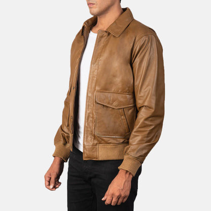 Stylish tan leather flight jacket for men, offering a classic military look and comfortable ribbed trim.