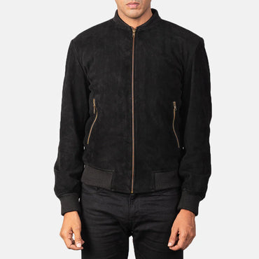 Front view of a man modeling a black suede bomber jacket, highlighting the soft texture, matching ribbed knit cuffs, and hem.