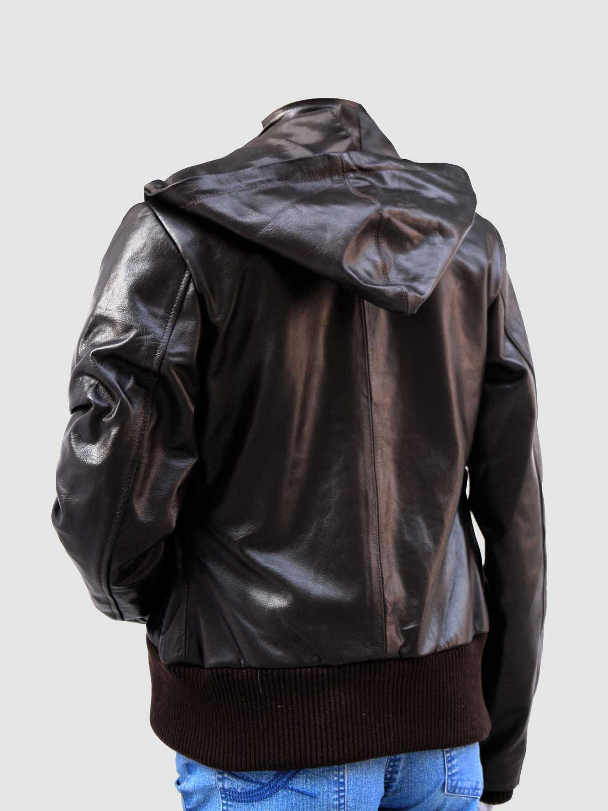 Front view of a dark brown leather jacket for women, showing the adjustable hood, four flap pockets with brass snaps, and a thick ribbed waistband.