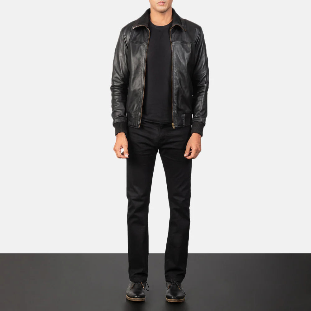 Men's Aviator black leather bomber jacket. Classic style with ribbed trims and a zippered utility arm pocket.