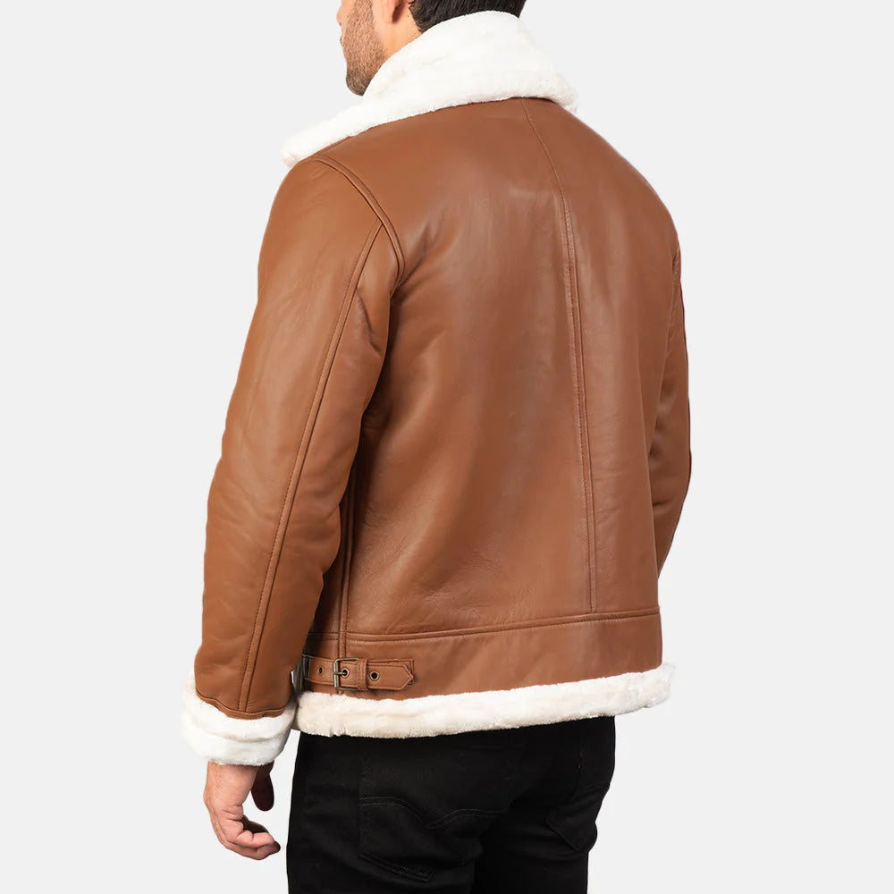 High-contrast brown leather bomber jacket fully lined with soft white shearling fur.