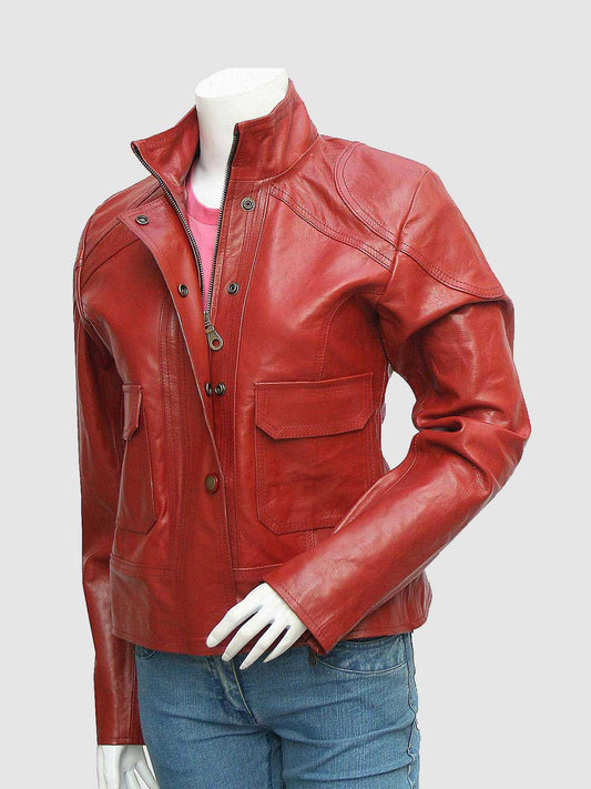 Front view of a tailored red leather field jacket for women, showing the high collar, chest and waist flap pockets, and dark hardware details.