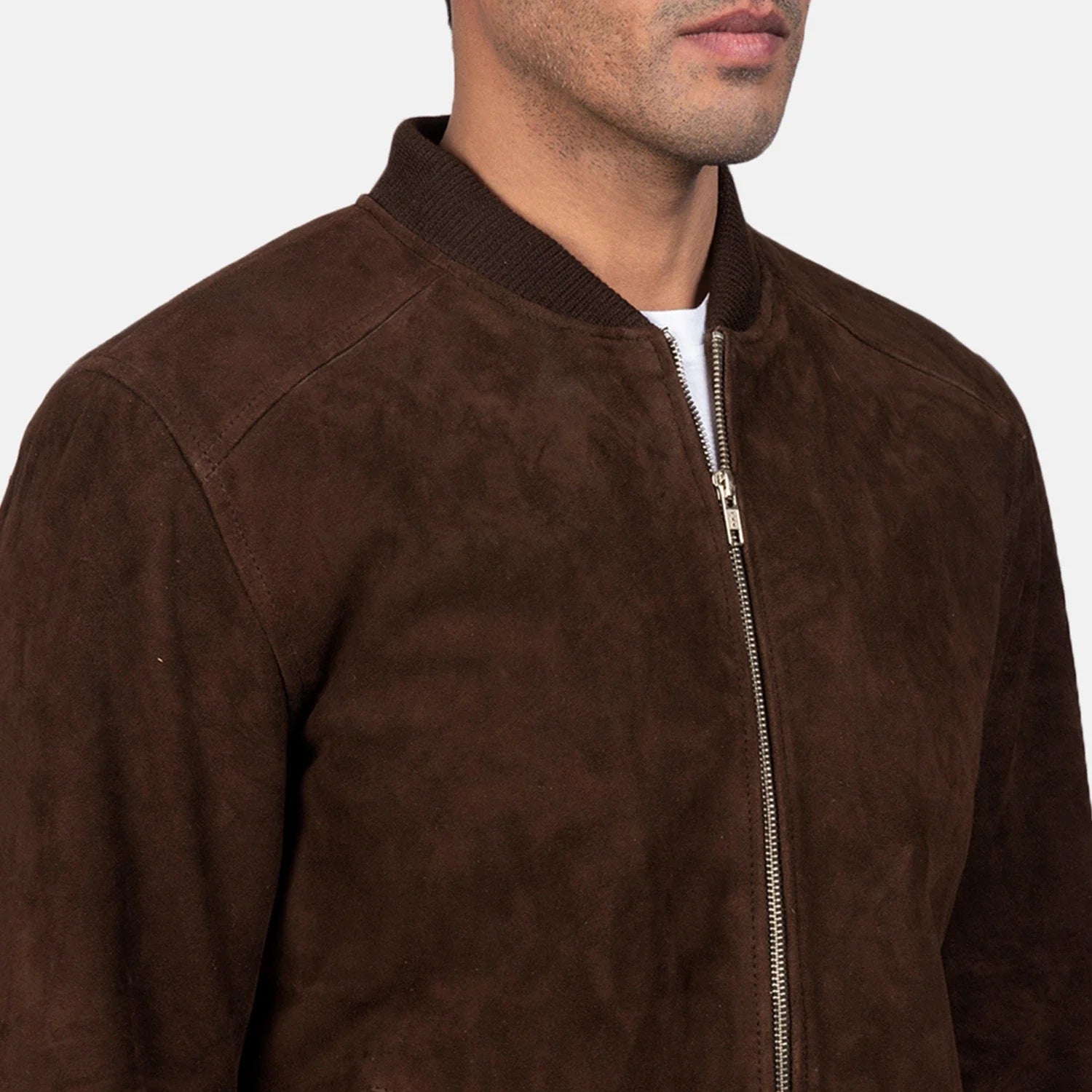 Brown suede bomber jacket. Minimalist design, soft leather, ribbed trim.
