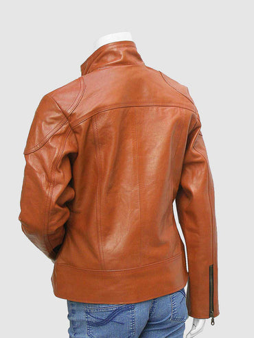 Close-up of a tailored brown leather blazer for women, showcasing the notched collar and rounded flap pockets on the lower front.