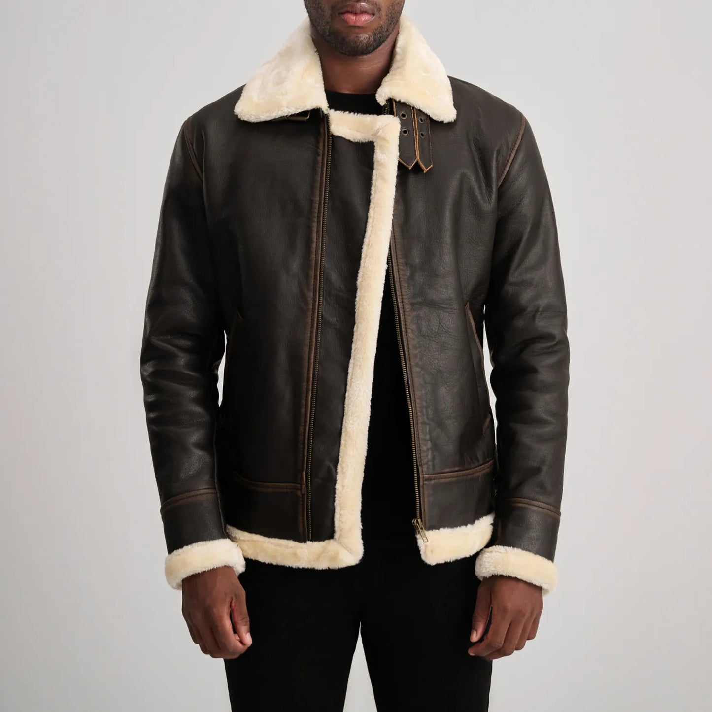 Back view of Men's Aviator B3 Brown Leather Shearling Jacket, showing white wool lining and exposed seams.