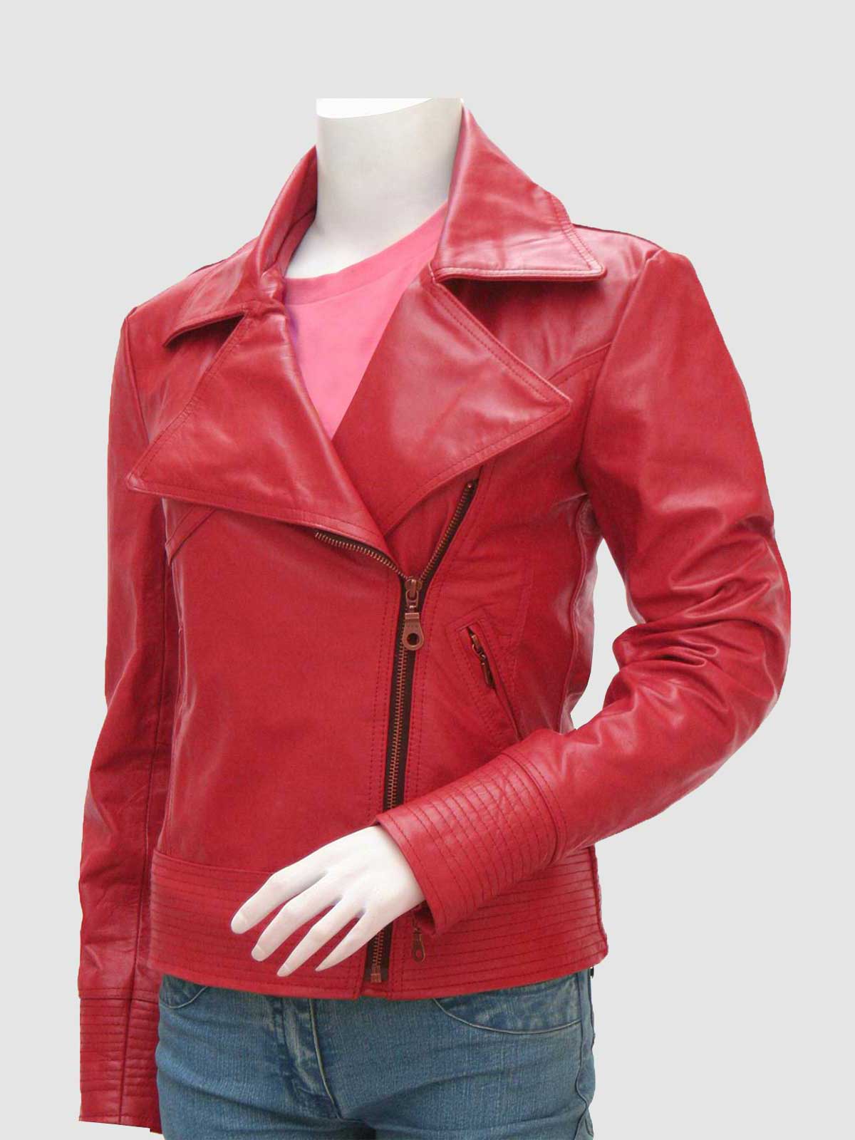 Front view of a tailored red leather biker jacket for women, showcasing the off-center zip, fold-over collar, and black hardware on the zip pockets.