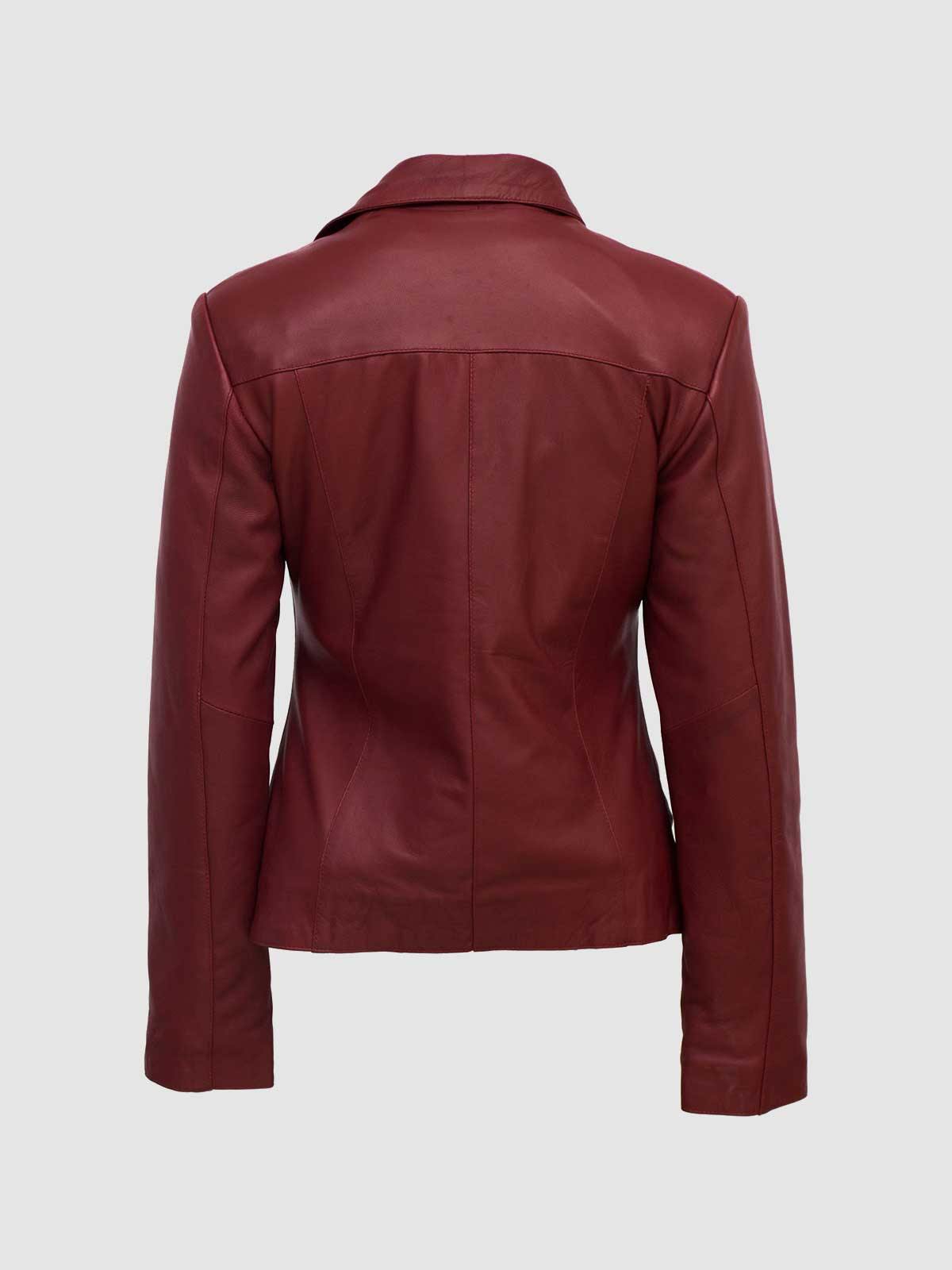 Vibrant cognac brown leather jacket with a minimalist moto-style design.
