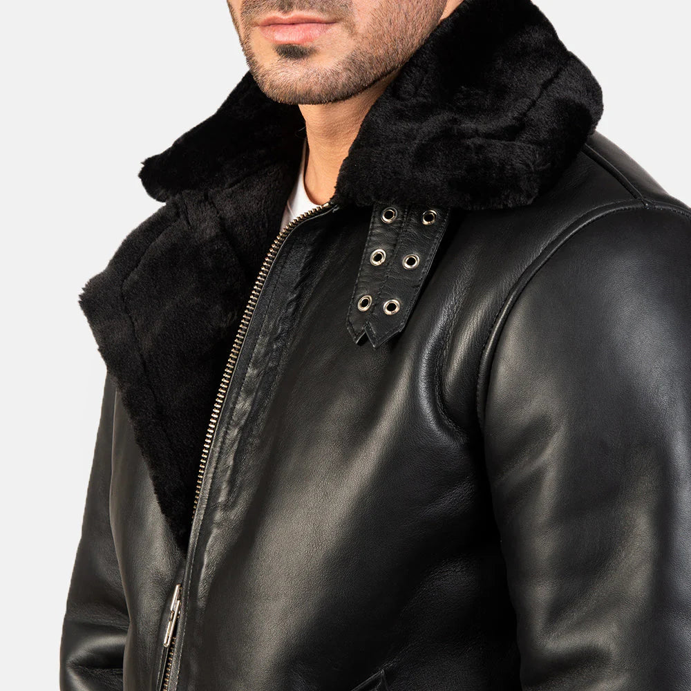 Black leather studded jacket. Double rider, quilted sleeves, silver studs.