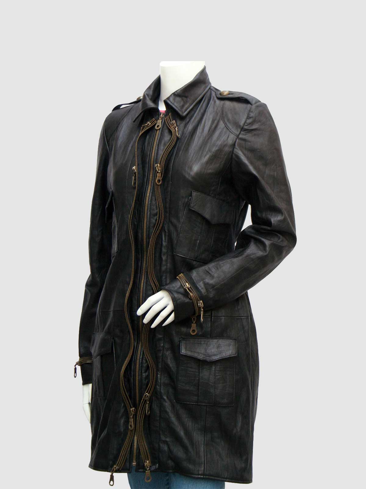 Front view of a black leather duster coat featuring a zipper cluster closure, collar, shoulder epaulets, and four patch/flap pockets.