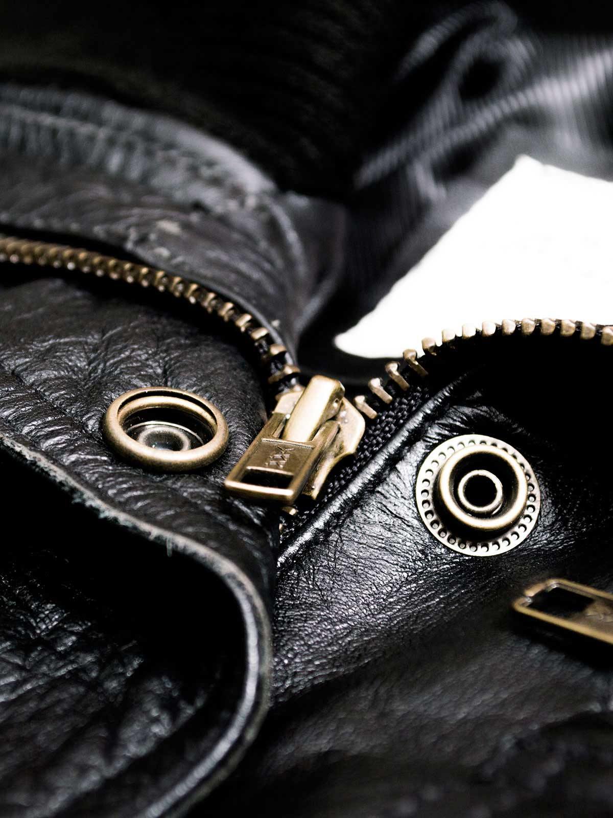Black leather utility jacket. Women's bomber, multi-pocket, knit collar, cargo style.