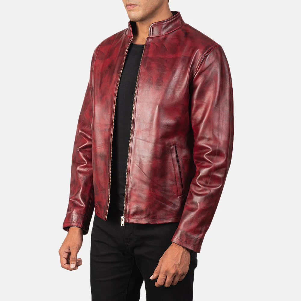 Burgundy sheepskin leather jacket for men. Distressed burnished finish, stand collar, minimalist zipper jacket.