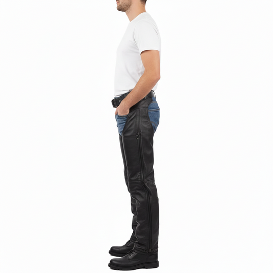 Close-up of the adjustable metallic buckle and reinforced front panel on professional black leather riding chaps.