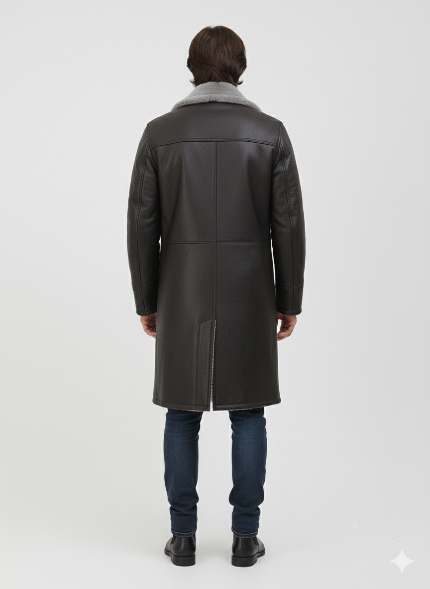 Close-up of the smooth black leather exterior and thick grey shearling lapels on a premium men's overcoat.