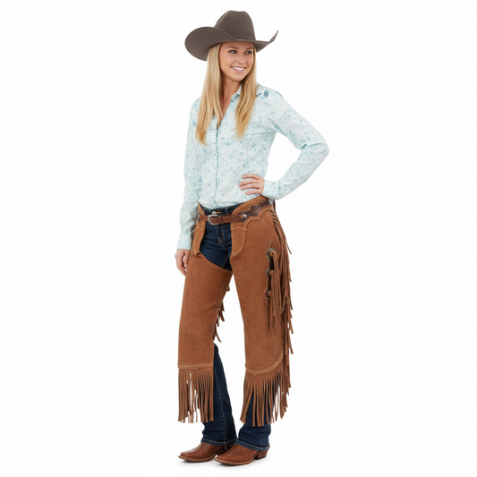 Women's sierra tan suede western chaps with a scalloped leather yoke, tiered side fringe, and silver hardware.