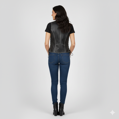 View of the black vest showing the V-neck, zipper, and subtle white contrast stitching along the seams.