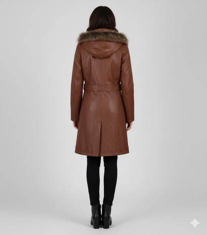 Close-up of the smooth cognac leather finish and soft fur trim on a premium women's winter trench.