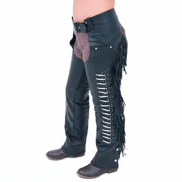 Detail view of silver conchos and bone toggles on dual-tone black and brown leather biker chaps.