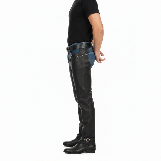Close-up of the silver-toned V-shaped hip piping and large metallic waist buckle on professional black riding chaps.