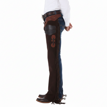 Close-up of the embossed floral leather waistband, metallic silver buckle, and integrated hip utility pocket on western riding chaps.