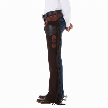 Close-up of the embossed floral leather waistband, metallic silver buckle, and integrated hip utility pocket on western riding chaps.