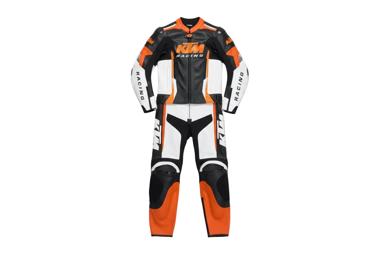 KTM Racing black and orange leather motorcycle racing suit with Red Bull branding and integrated armor.