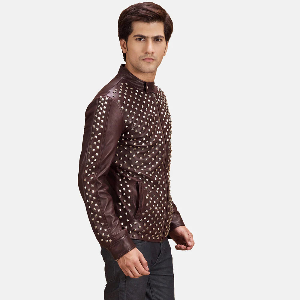 Unique studded maroon leather jacket for men, offering a bold, high-fashion statement and aggressive punk-rock style.