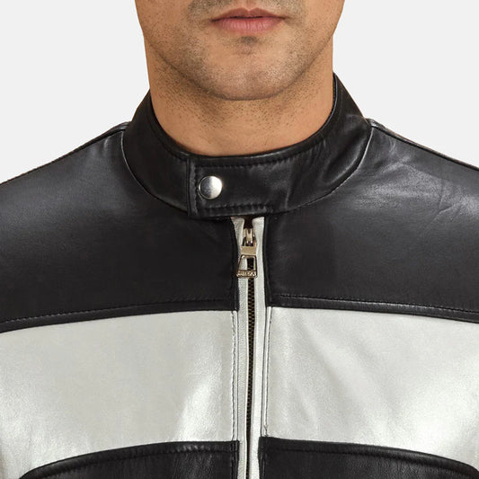 Front view of a man modeling a fully zipped black and white/silver leather bomber jacket, highlighting the contrasting central panel and ribbed hem.