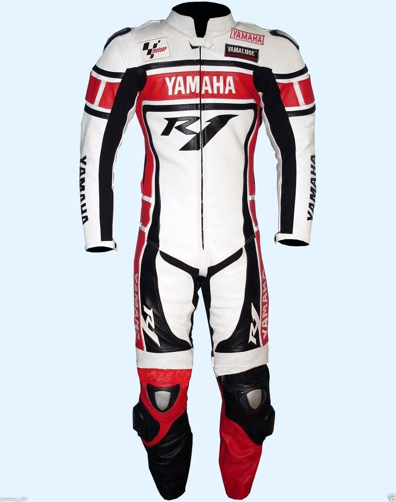 Yamaha Factory Racing white, red, and black leather motorcycle suit with R1 logos and integrated armor.