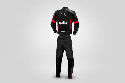 Detailed view of the Aprilia Racing chest branding, Akrapovič patch, and accordion stretch panels on a professional racing suit.