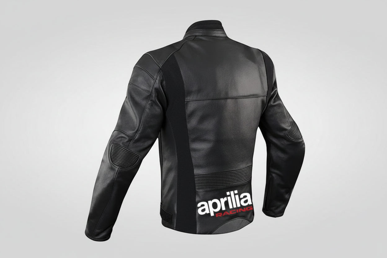 Detailed view of the Aprilia Racing chest branding, red technical strikes, and white leather panels on a professional racing jacket.