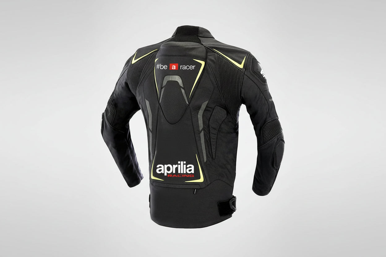 Detailed view of the Aprilia Racing chest logo and high-visibility yellow technical accents on a professional leather racing jacket.