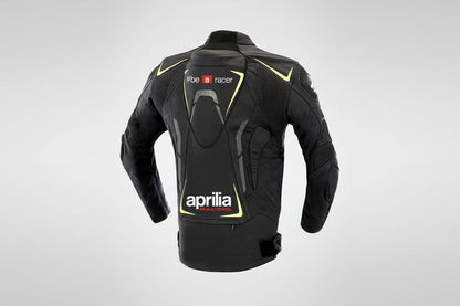 Detailed view of the Aprilia Racing chest logo and high-visibility yellow technical accents on a professional leather racing jacket.