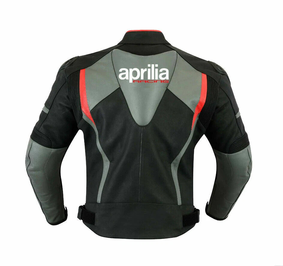 Detailed view of the Aprilia Racing chest branding, Akrapovič logo, and professional grey technical leather panels.