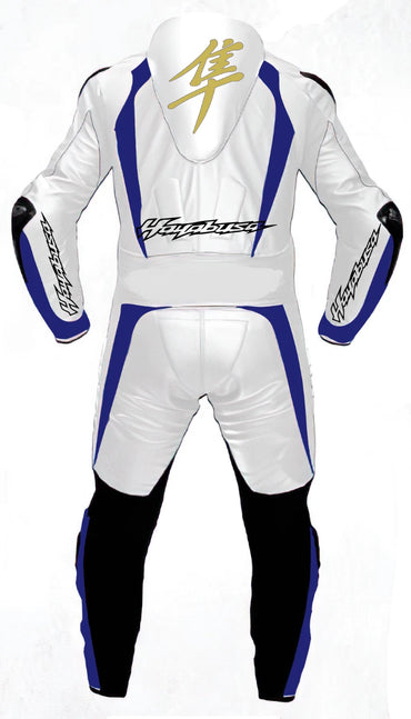 Detailed view of the gold Hayabusa kanji chest logo and royal blue technical panels on a professional track suit.