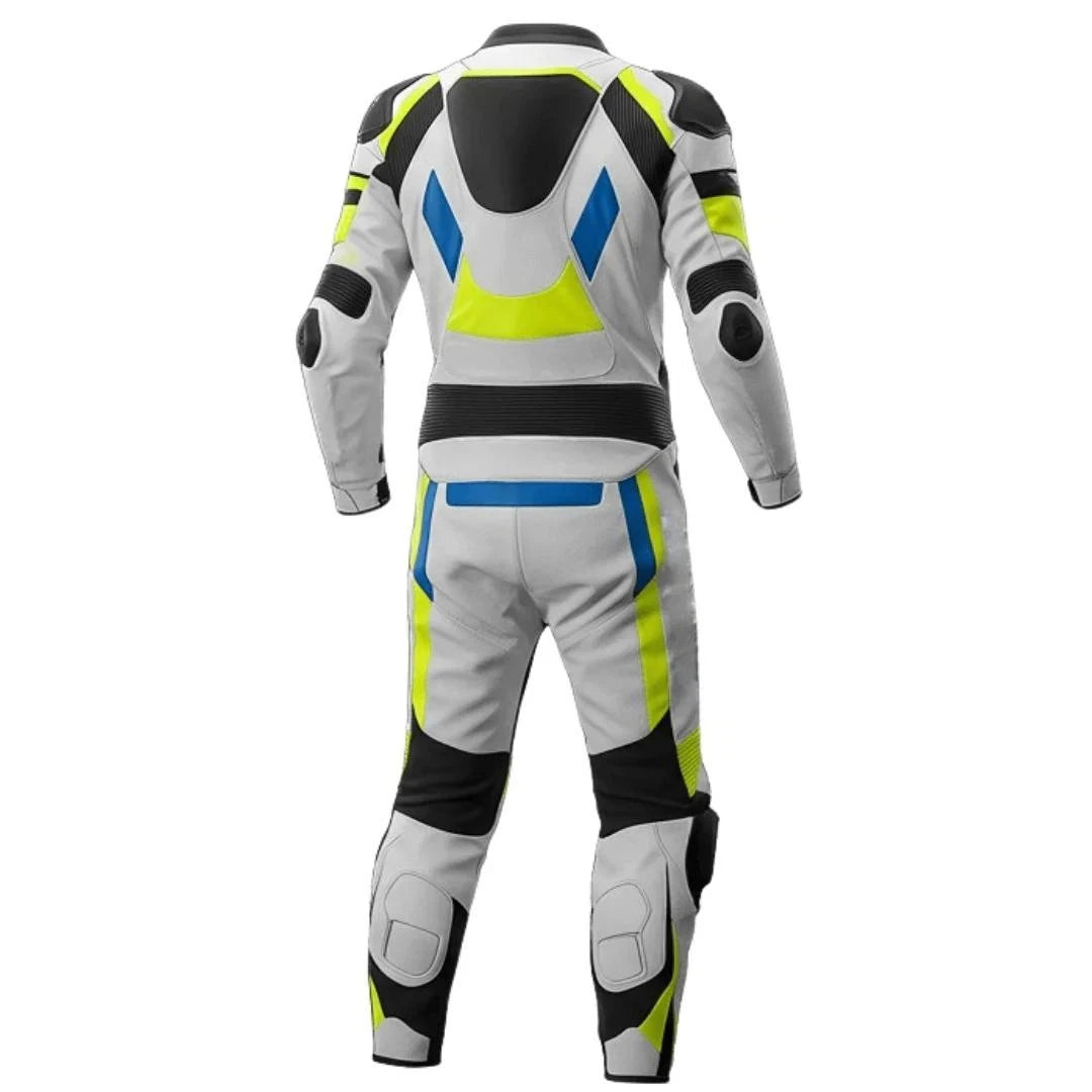 Detailed view of the blue Suzuki chest branding, neon yellow high-visibility panels, and black knee sliders on a track suit.
