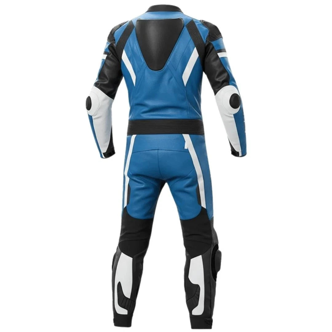 Detailed view of the Suzuki chest logo, royal blue technical panels, and black knee sliders on a professional track suit.